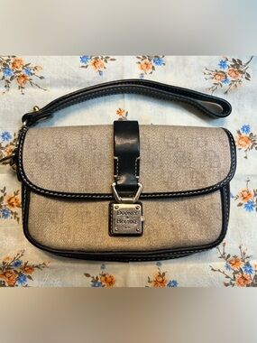Dooney & Bourke Beige Canvas wristlet with Black Leather Trim